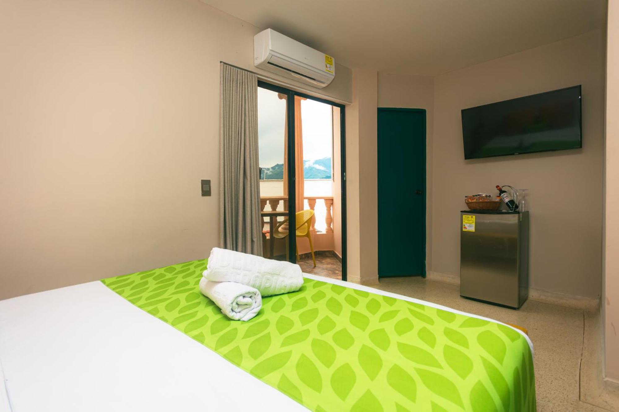 Del Tropico Hotel سوبيتران الغرفة الصورة